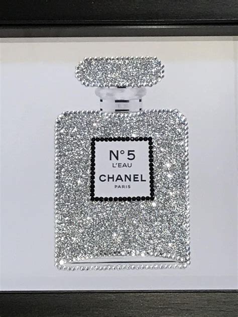 chanel perfume bottle wall art.